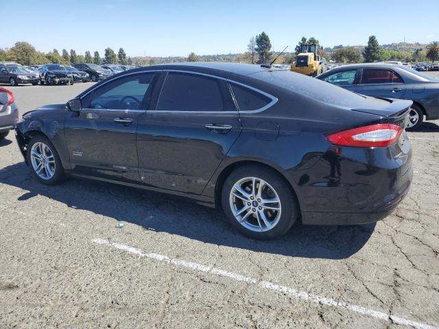 Photo 2 from auction – 2016 FORD FUSION TITANIUM PHEV with VIN 3FA6P0SU9GR316342