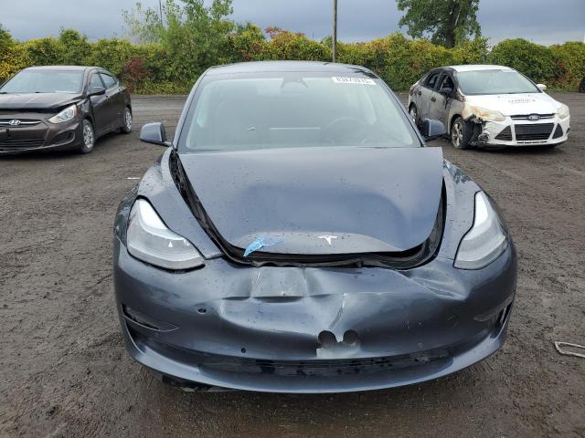Photo 5 from auction – 2022 TESLA MODEL 3 with VIN 5YJ3E1EAXNF326032