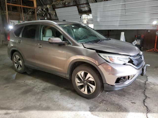 Photo 4 from auction – 2016 HONDA CR-V TOURING with VIN 5J6RM4H94GL025010
