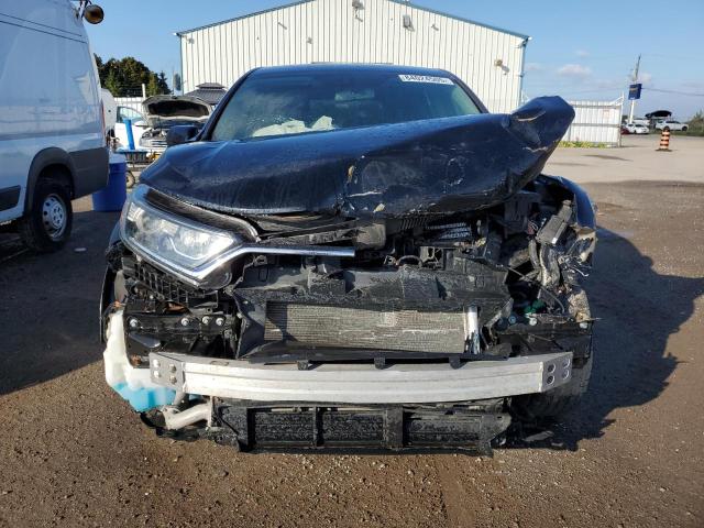 Photo 5 from auction – 2017 HONDA CR-V LX with VIN 2HKRW1H33HH002284
