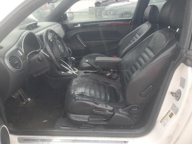 Photo 7 from auction – 2013 VOLKSWAGEN BEETLE TUR with VIN 3VWVS7AT9DM684094
