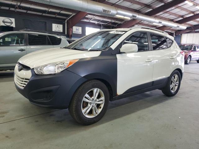 HYUNDAI TUCSON GLS 2010 with VIN KM8JUCAC8AU023034 - Photo from auction