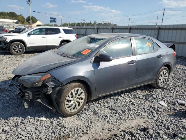 TOYOTA COROLLA L 2017 with VIN 5YFBURHE8HP667806 - Photo from auction