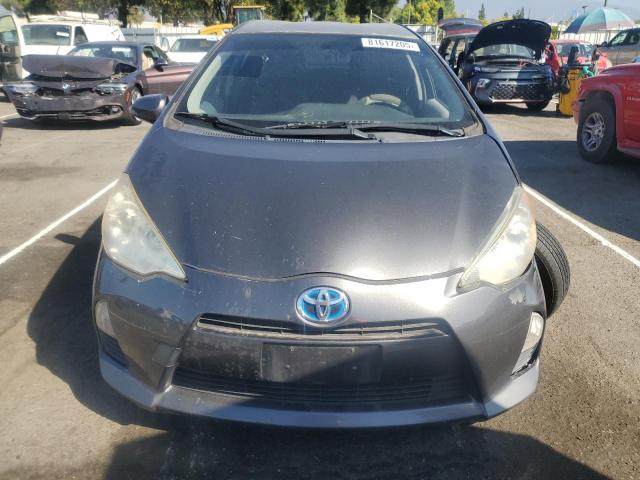 Photo 5 from auction – 2014 TOYOTA PRIUS C with VIN JTDKDTB37E1560850