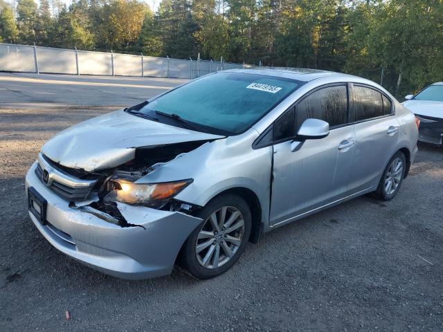 HONDA CIVIC LX 2012 with VIN 2HGFB2F57CH113111 - Photo from auction