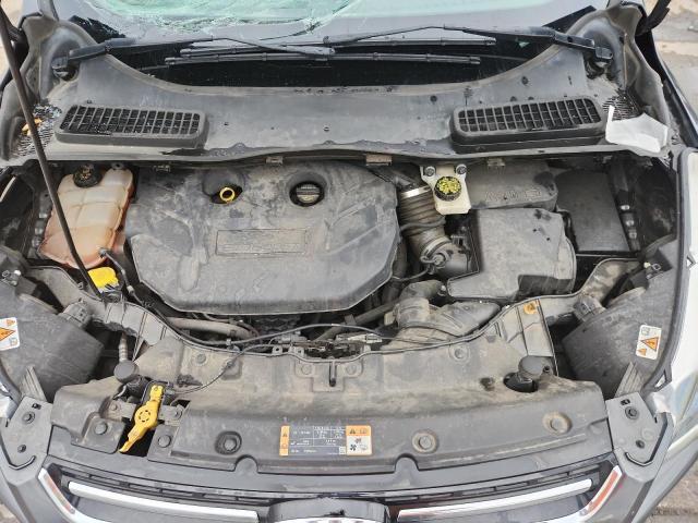 Photo 12 from auction – 2016 FORD ESCAPE TIT with VIN 1FMCU9J90GUC79354
