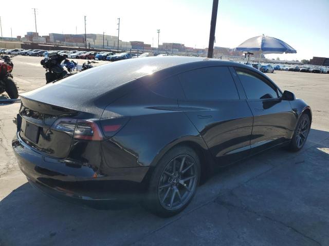Photo 3 from auction – 2021 TESLA MODEL 3 with VIN 5YJ3E1EA7MF938610