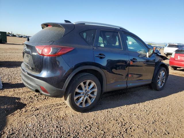 Photo 3 from auction – 2015 MAZDA CX-5 GT with VIN JM3KE4DYXF0520157
