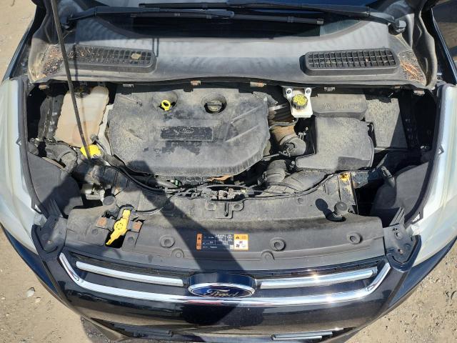 Photo 12 from auction – 2016 FORD ESCAPE TITANIUM with VIN 1FMCU9J9XGUA16496
