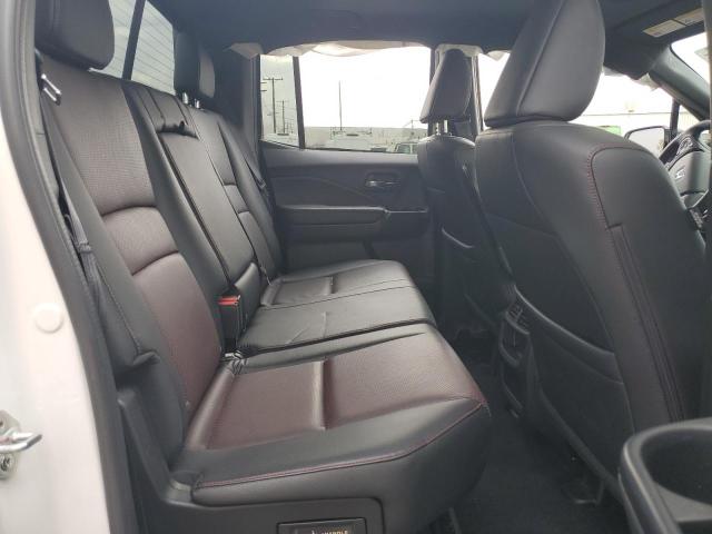 Photo 10 from auction – 2023 HONDA RIDGELINE with VIN 5FPYK3F87PB000494