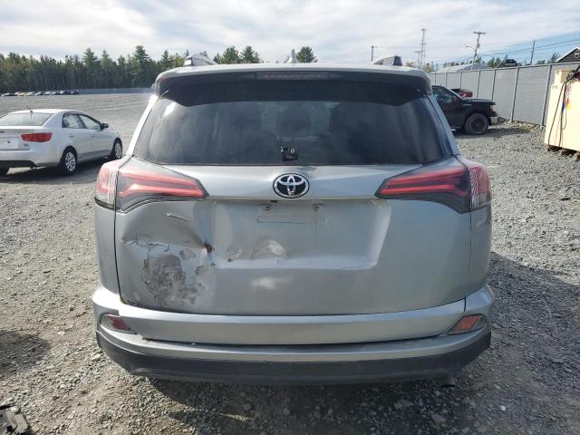 Photo 6 from auction – 2018 TOYOTA RAV4 LE with VIN 2T3ZFREV5JW502661