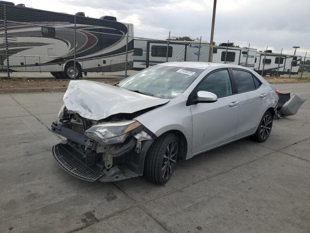 TOYOTA COROLLA L 2015 with VIN 5YFBURHE7FP285909 - Photo from auction