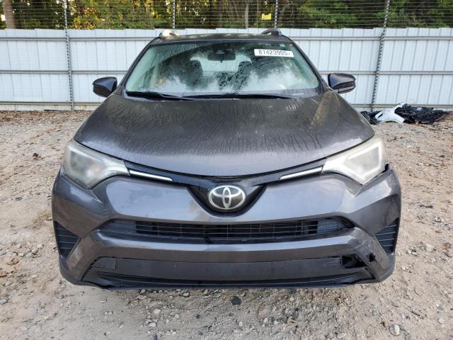 Photo 5 from auction – 2017 TOYOTA RAV4 LE with VIN JTMZFREV1HJ122676