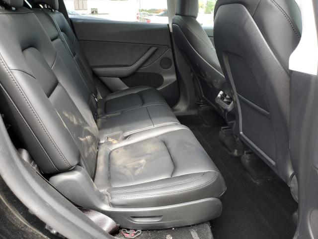 Photo 11 from auction – 2023 TESLA MODEL Y with VIN 7SAYGAEE6PF860007