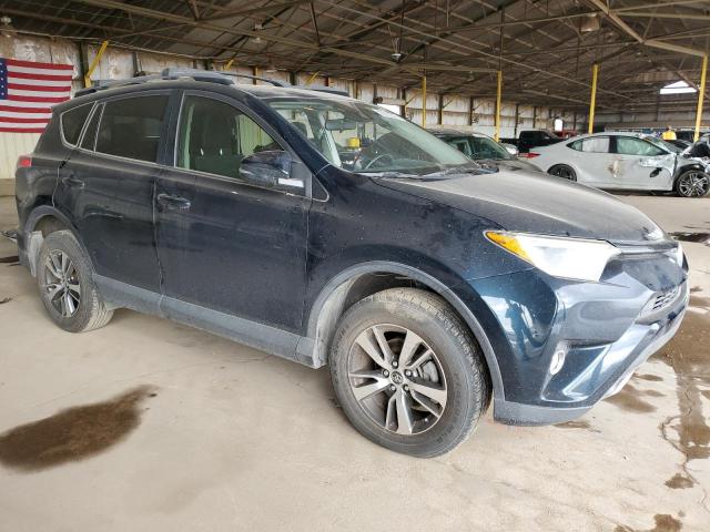 Photo 4 from auction – 2017 TOYOTA RAV4 XLE with VIN JTMWFREV2HJ707995
