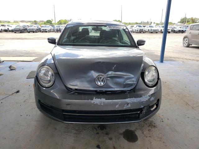 Photo 5 from auction – 2013 VOLKSWAGEN BEETLE with VIN 3VWJP7AT9DM662077