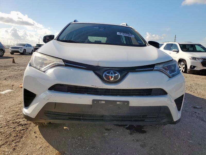 Photo 5 from auction – 2017 TOYOTA RAV4 LE with VIN JTMZFREV3HJ133209