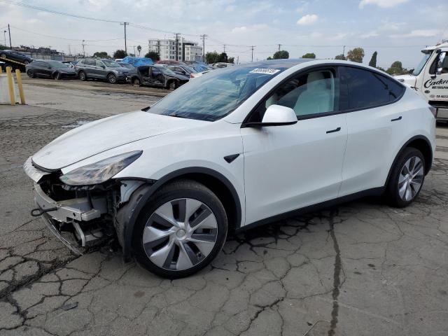 TESLA MODEL Y 2023 with VIN 7SAYGAEE1PF944168 - Photo from auction