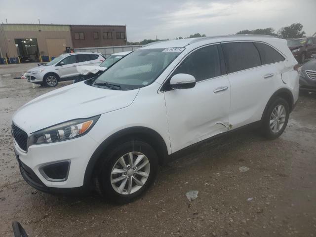 KIA SORENTO LX 2016 with VIN 5XYPG4A38GG128498 - Photo from auction