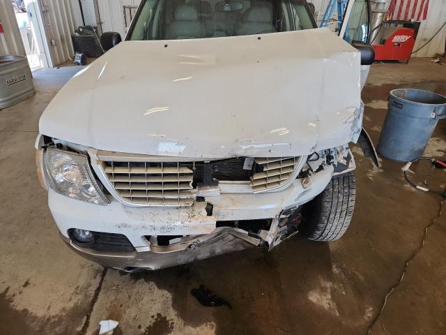 Photo 12 from auction – 2003 FORD EXPLORER E with VIN 1FMDU74W03UB55296
