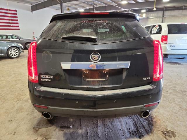 Photo 6 from auction – 2014 CADILLAC SRX PERFOR with VIN 3GYFNCE39ES628603