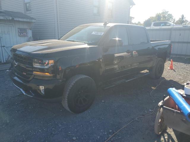 CHEVROLET SILVERADO 2018 with VIN 3GCUKREC6JG580712 - Photo from auction