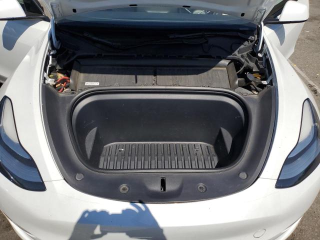 Photo 12 from auction – 2022 TESLA MODEL Y with VIN 7SAYGAEE1NF490744