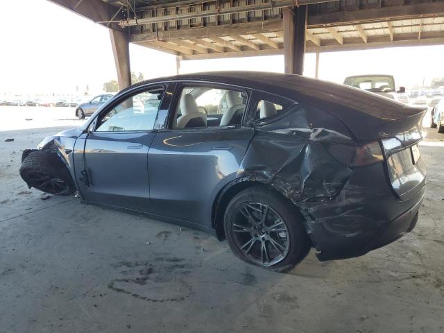 Photo 2 from auction – 2025 TESLA MODEL Y with VIN 7SAYGDED3SF315769