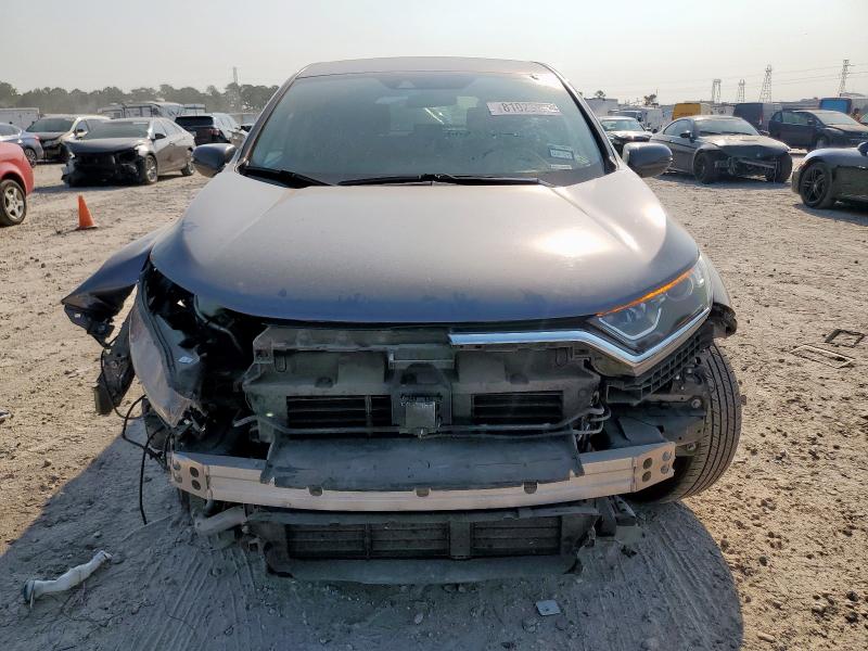 Photo 5 from auction – 2021 HONDA CR-V EX with VIN 7FARW2H54ME022774