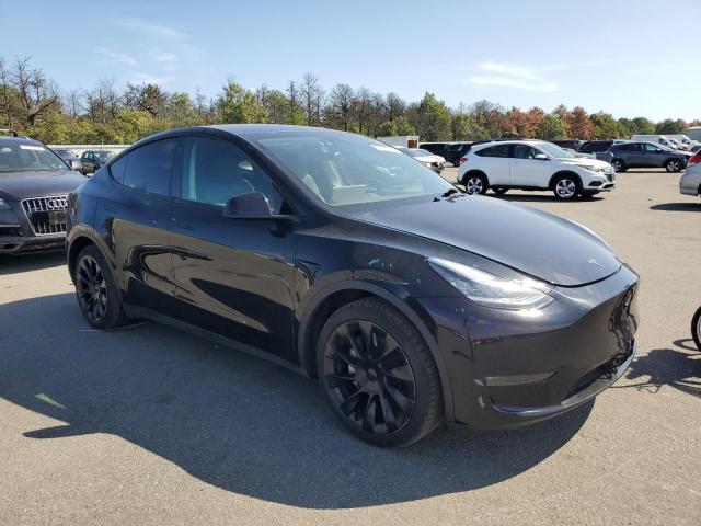 Photo 4 from auction – 2023 TESLA MODEL Y with VIN 7SAYGDEEXPA052080