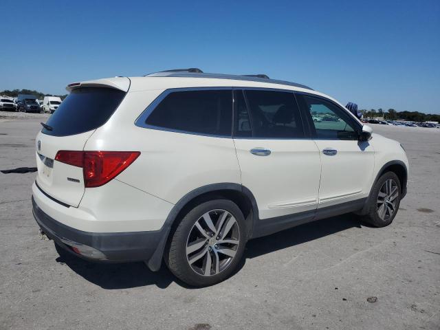 Photo 3 from auction – 2016 HONDA PILOT TOURING with VIN 5FNYF5H95GB023514
