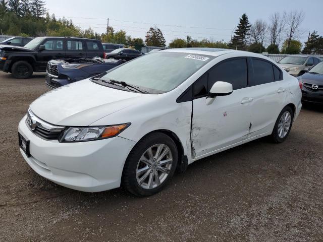 HONDA CIVIC LX 2012 with VIN 2HGFB2F52CH106177 - Photo from auction