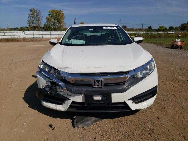 Photo 5 from auction – 2018 HONDA CIVIC LX with VIN 19XFC2F58JE209141