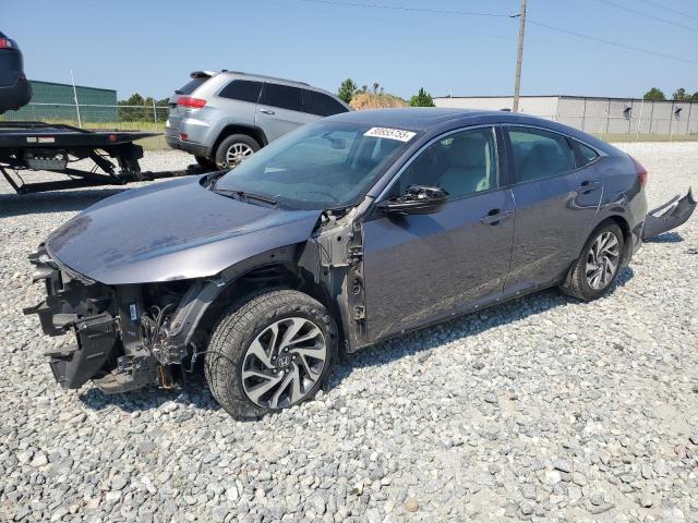 HONDA CIVIC EX 2017 with VIN 19XFC2F74HE022748 - Photo from auction