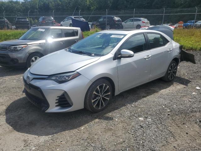 TOYOTA COROLLA L 2017 with VIN 2T1BURHE9HC831788 - Photo from auction