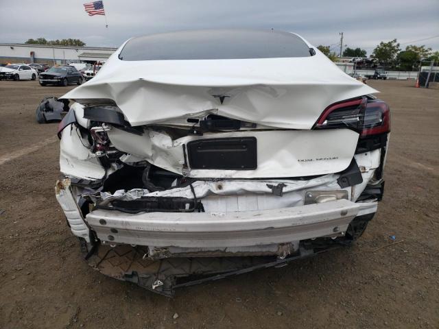 Photo 6 from auction – 2022 TESLA MODEL 3 with VIN 5YJ3E1EB3NF165029