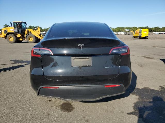 Photo 6 from auction – 2022 TESLA MODEL Y with VIN 7SAYGAEE0NF520218