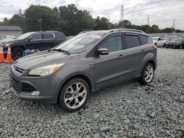 FORD ESCAPE TIT 2014 with VIN 1FMCU0J97EUB38998 - Photo from auction