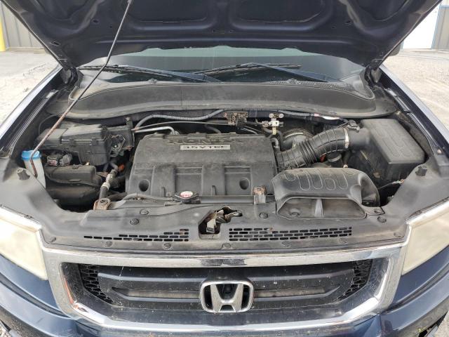 Photo 11 from auction – 2009 HONDA RIDGELINE with VIN 5FPYK16219B100397