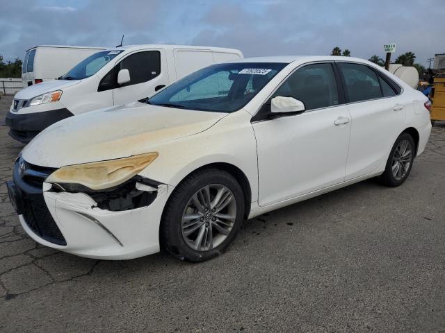 TOYOTA CAMRY LE 2015 with VIN 4T1BF1FKXFU012126 - Photo from auction