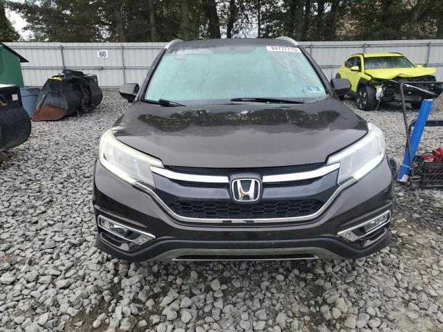 Photo 5 from auction – 2016 HONDA CR-V EXL with VIN 2HKRM4H75GH677286