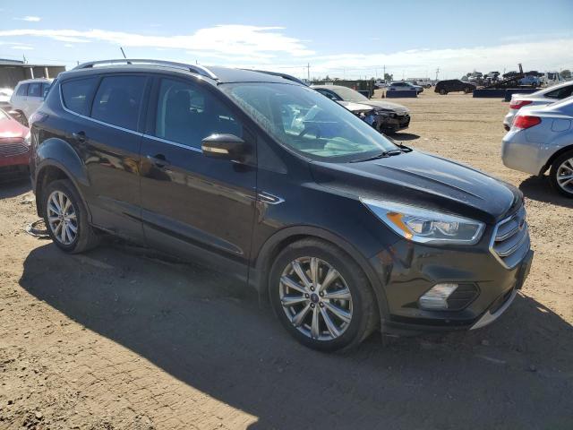 Photo 4 from auction – 2018 FORD ESCAPE TIT with VIN 1FMCU9J91JUA31105