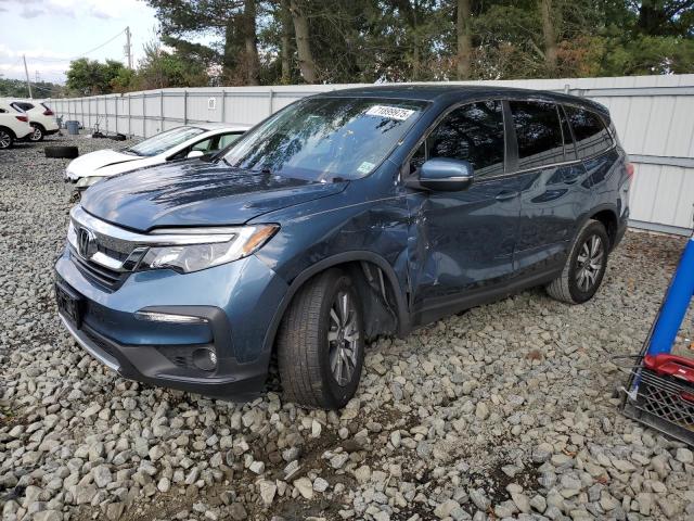 HONDA PILOT EXL 2022 with VIN 5FNYF6H53NB025634 - Photo from auction