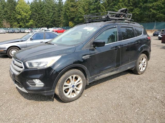 FORD ESCAPE SE 2018 with VIN 1FMCU0GD4JUC91389 - Photo from auction