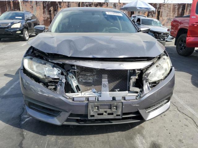 Photo 5 from auction – 2016 HONDA CIVIC EX with VIN 19XFC2F71GE056337