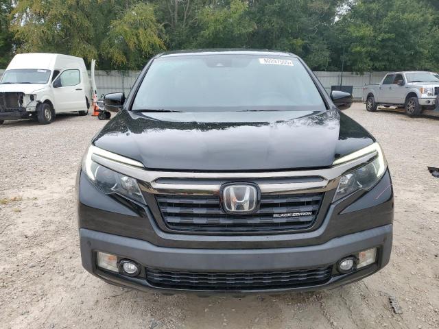 Photo 5 from auction – 2019 HONDA RIDGELINE with VIN 5FPYK3F89KB020674