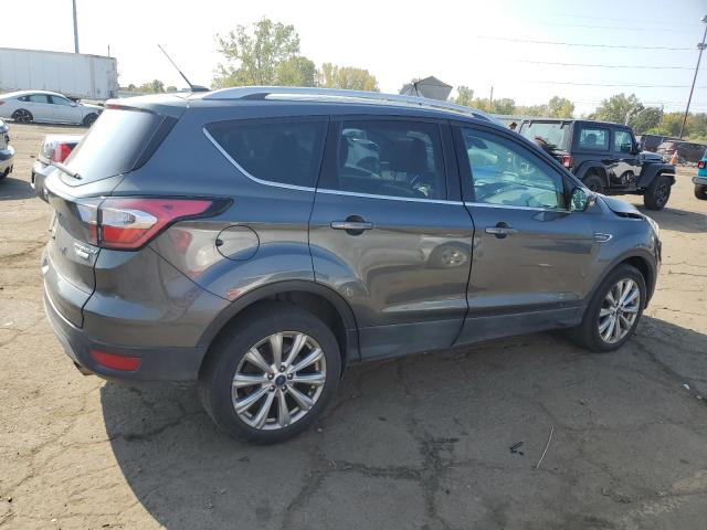Photo 3 from auction – 2017 FORD ESCAPE TITANIUM with VIN 1FMCU0JD6HUE92293