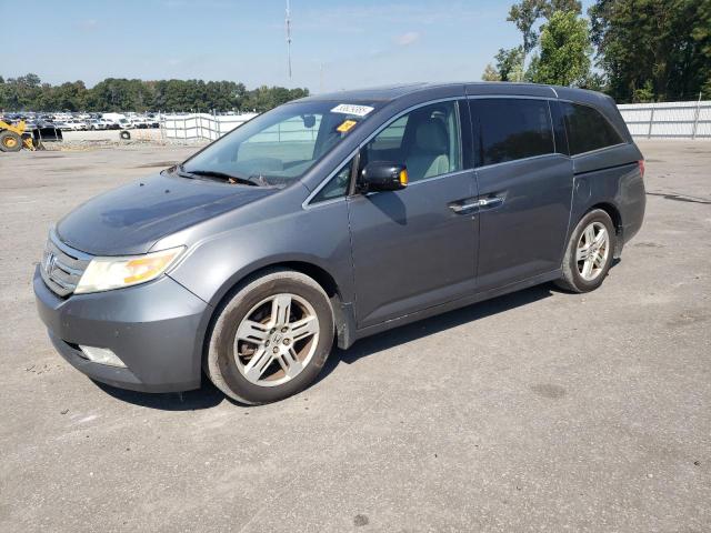 HONDA ODYSSEY TOURING 2012 with VIN 5FNRL5H92CB009738 - Photo from auction