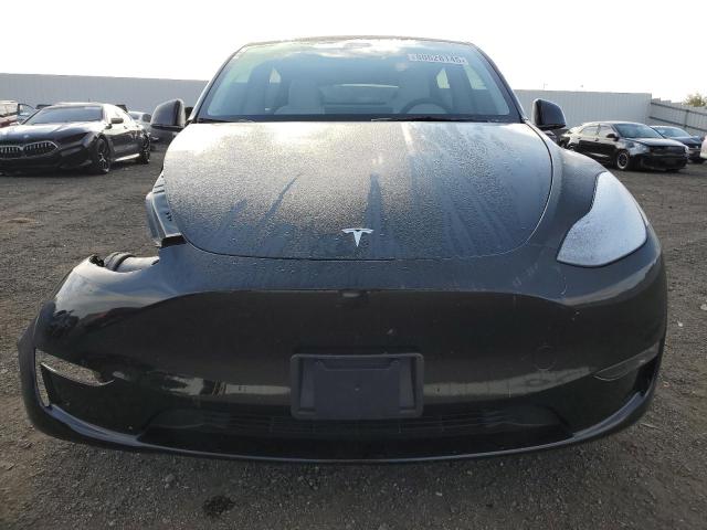 Photo 5 from auction – 2023 TESLA MODEL Y with VIN 7SAYGDEE2PF780477