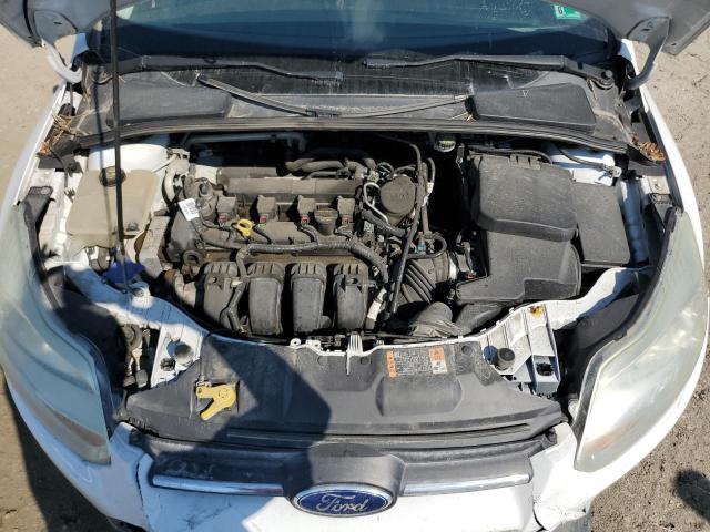 Photo 11 from auction – 2014 FORD FOCUS SE with VIN 1FADP3F25EL356978